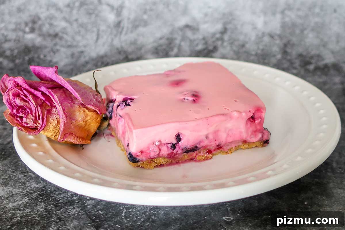 No-Bake Gluten-Free Dessert Recipes 7 creamy berry squares on a plate
