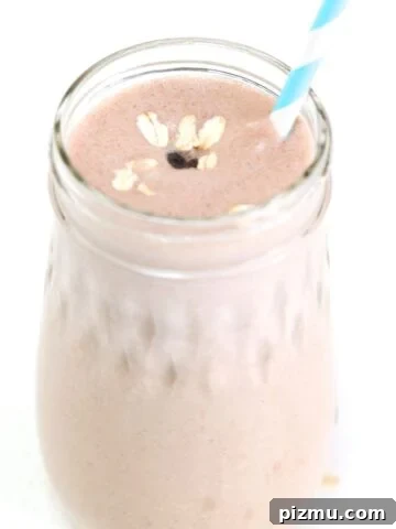 Peanut Butter Banana Oatmeal Smoothie in a glass jar.