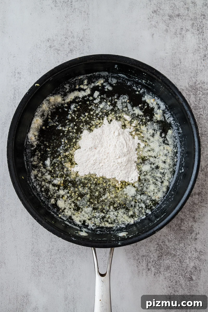 Creamy Chicken Alfredo Lasagna with Ricotta Recipe 8 Butter and flour in skillet.