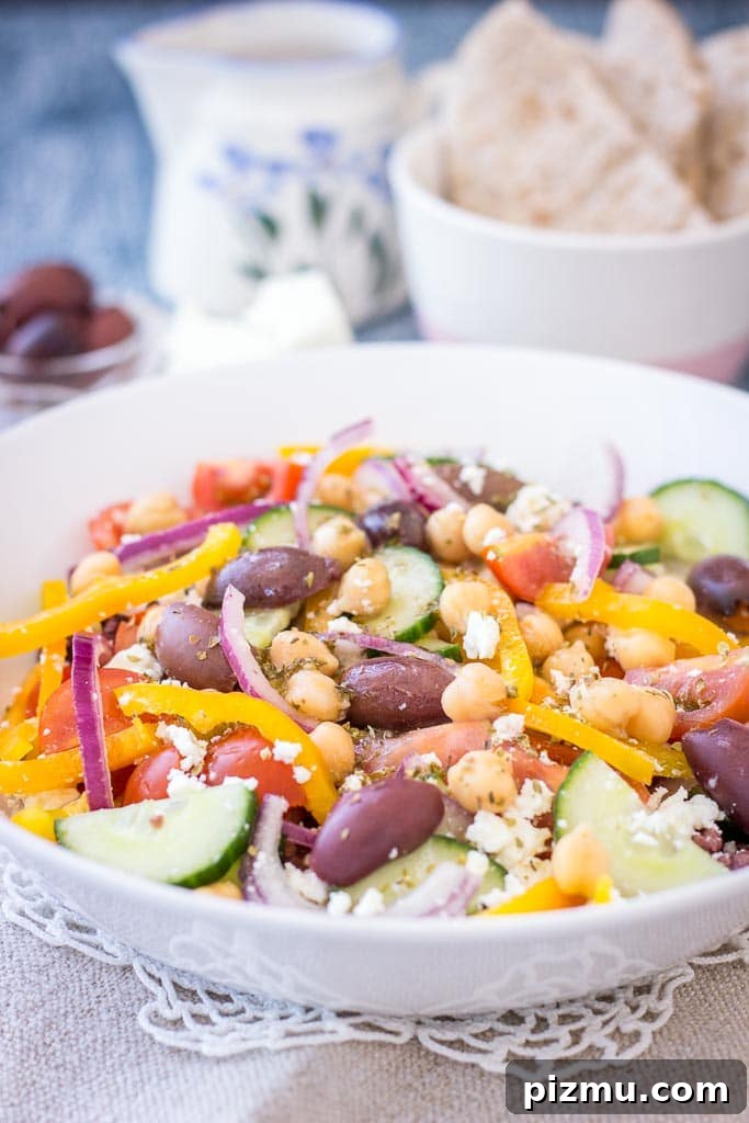 Easy Greek Chickpea Salad with Greek Salad Dressing served in a bowl