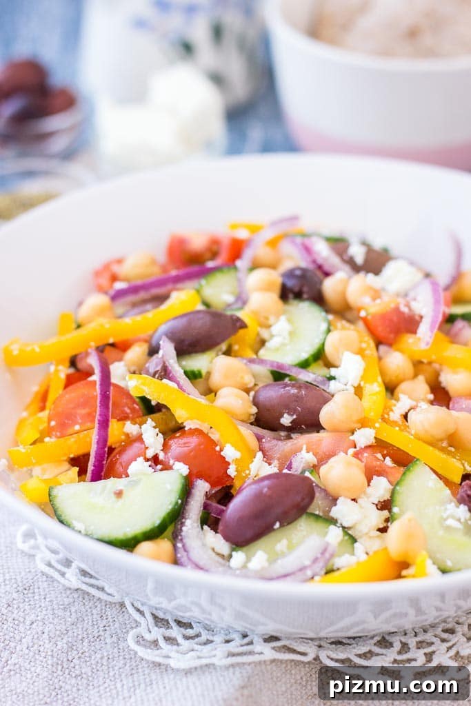 Easy Greek Chickpea Salad with Greek Salad Dressing served in a bowl