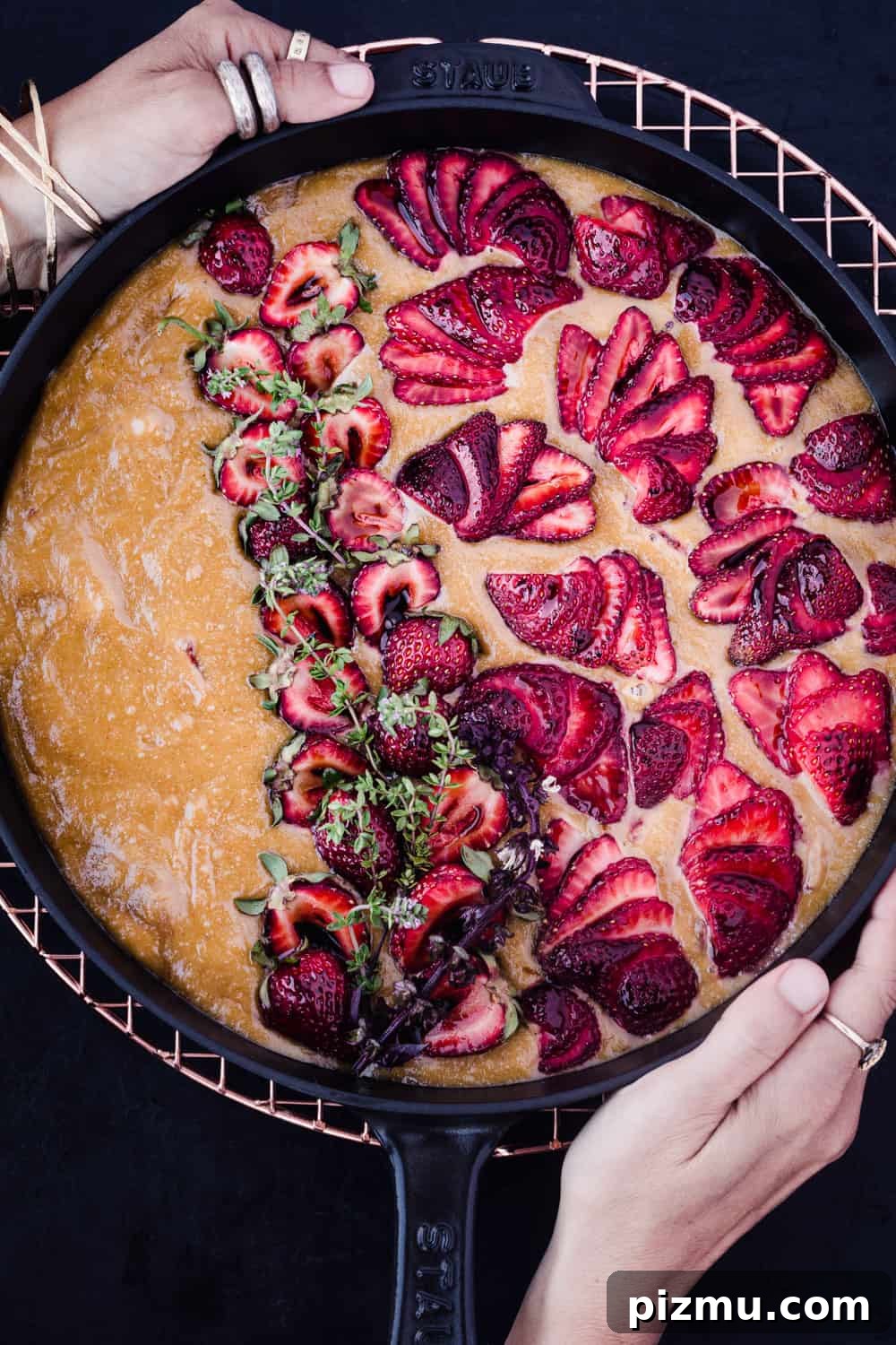 Strawberry Olive Oil Cake for Breakfast, Brunch and Dessert 2 Daniela Gerson's hands the olive olive and fresh strawberry cake, overhead shot.