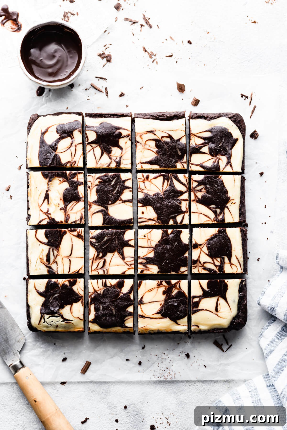 Cheesecake Swirl Brownies with Cream Cheese Filling 2 overhead shot of brownies with cheesecake cut into 12 individual squares