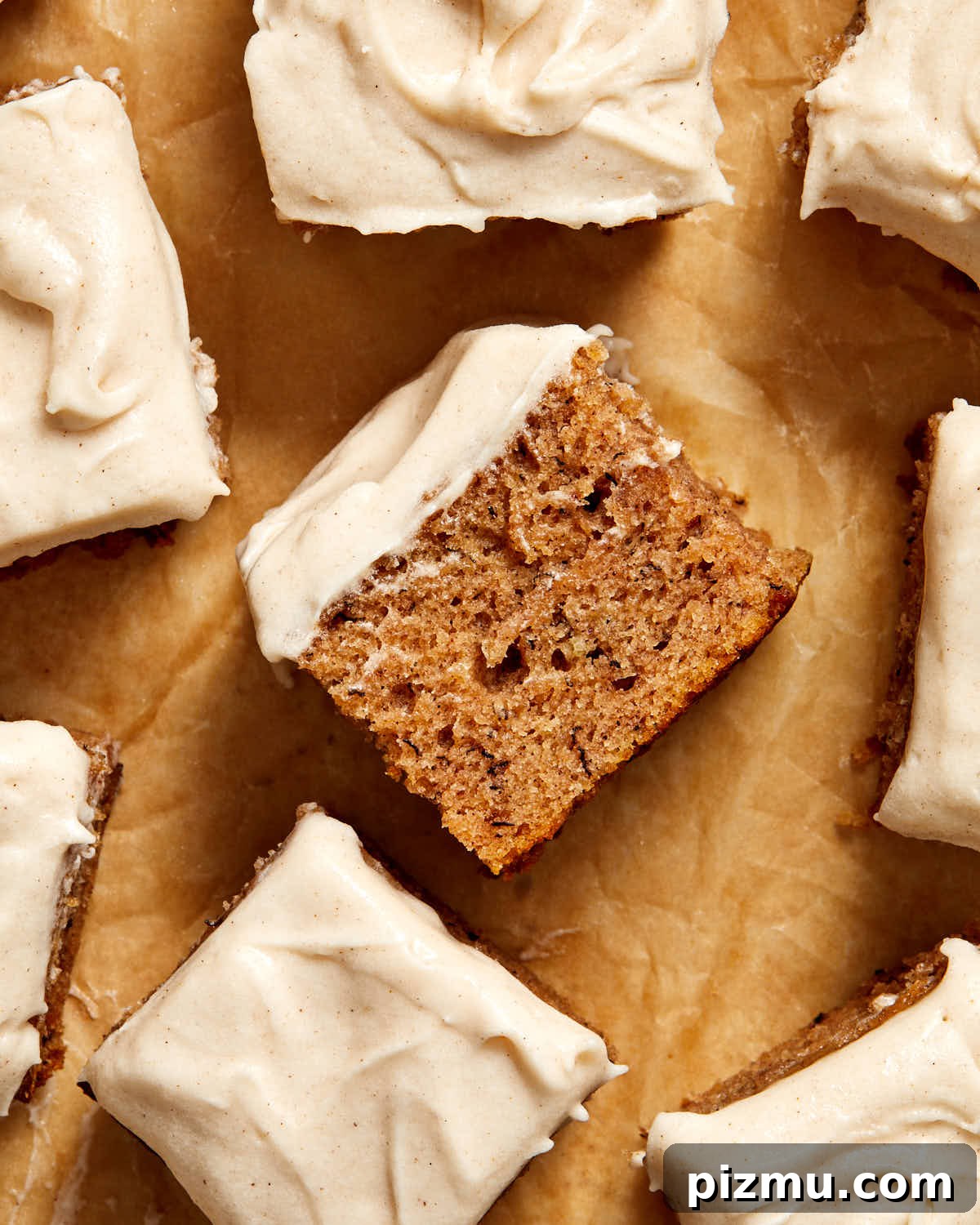 Moist Banana Cake Recipe with Vegetable Oil 8 Piece of cake turned on its side on brown parchment paper.