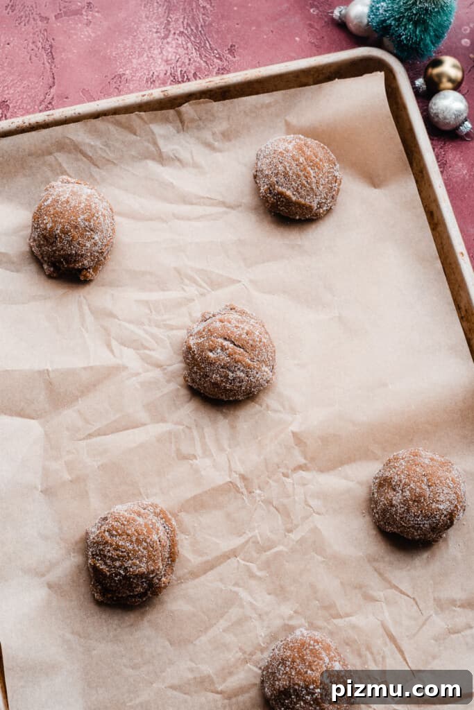Dough balls on a baking sheet.