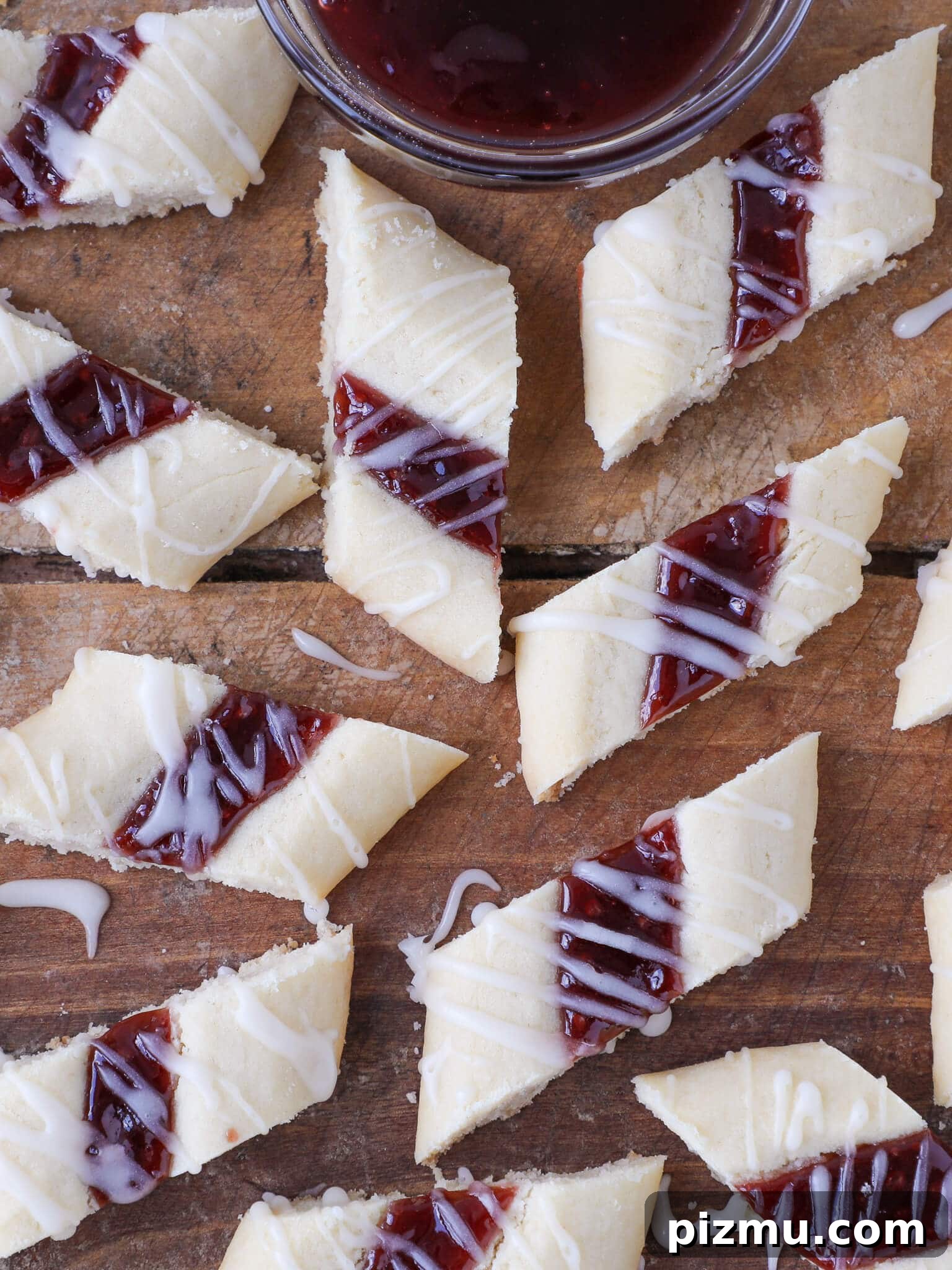 20 Classic Christmas Cookie Recipes to Bake This Season 19 Danish Raspberry Ribbon Cookies Wooden Backdrop.