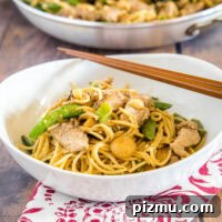 cropped in picture of stir fry noodles in a bowl
