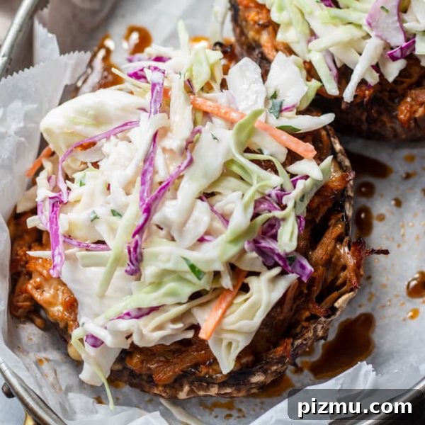 Pulled pork stuffed portobello with coleslaw.