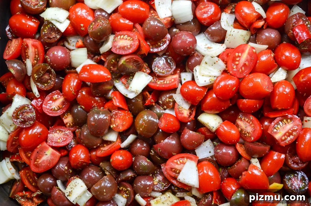 Roasted Cherry Tomato Sauce: Serve Fresh or Freeze 4 cherry tomato sauce ingredients in roasting pan