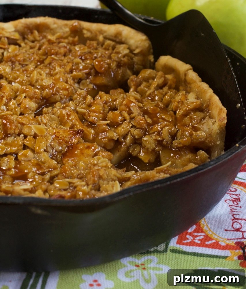 Skillet Apple Streusel Pie with Cinnamon Crunch 8 Slice of Skillet Apple Streusel Pie with caramel