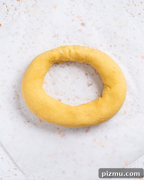 Keto Pumpkin Kringle Danish: Flaky Low-Carb Recipe 13 Making a circle with the dough log.