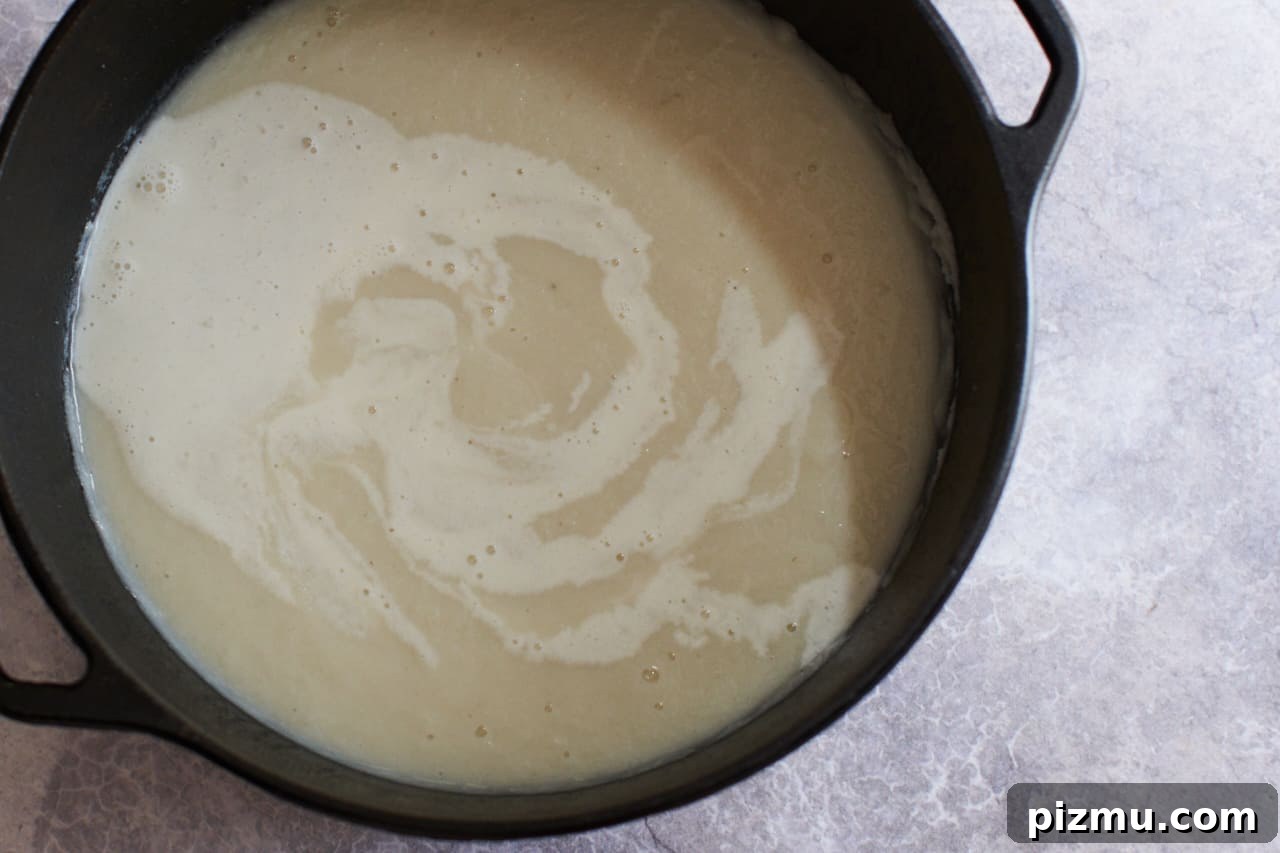 Creamy French Cauliflower Soup with Brie 7 Creamy cauliflower soup in a pot.