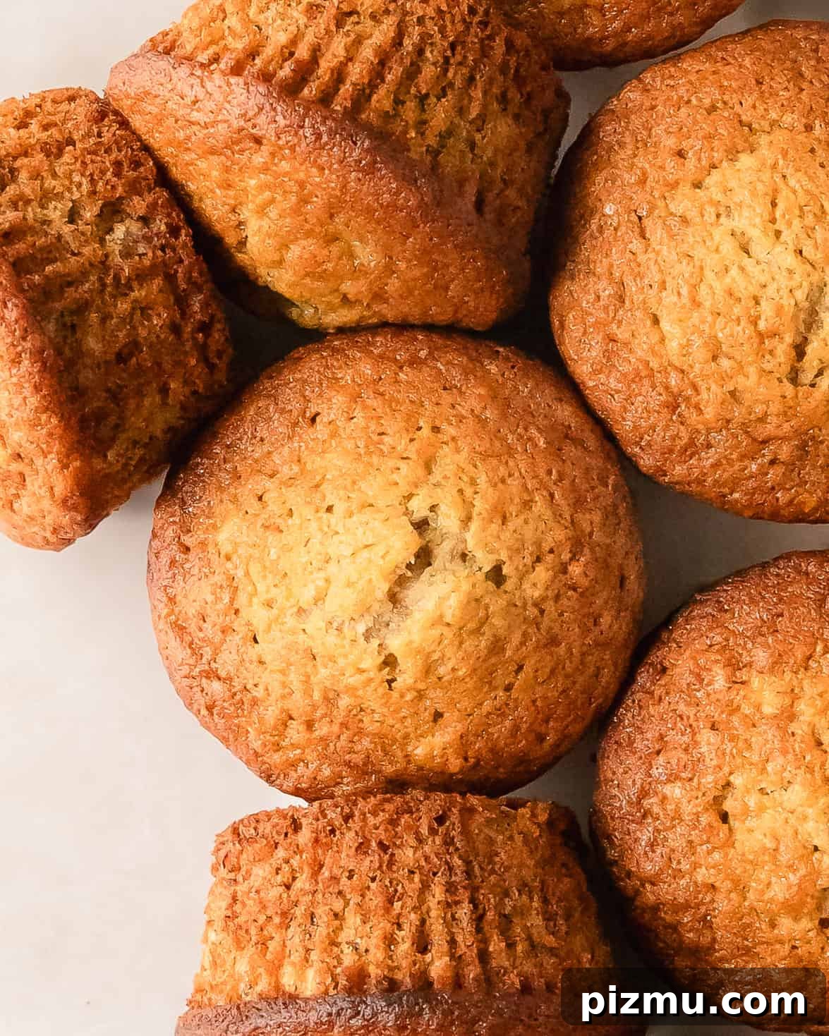Small-Batch Banana Muffins (Makes 2) 6 Two banana muffins served on a plate