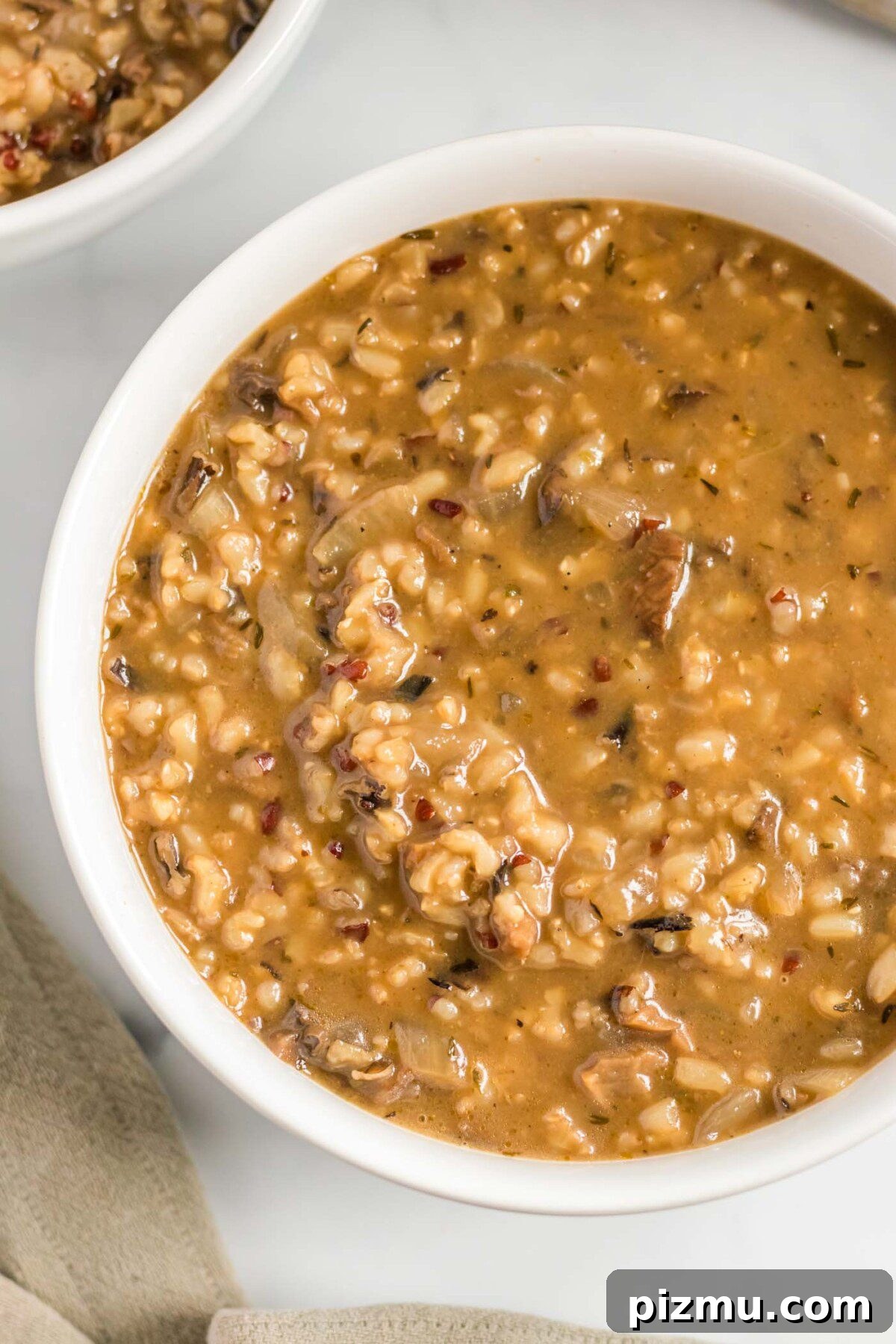 Creamy Vegan Mushroom and Wild Rice Soup 9 Bowl of wild rice mushroom soup.