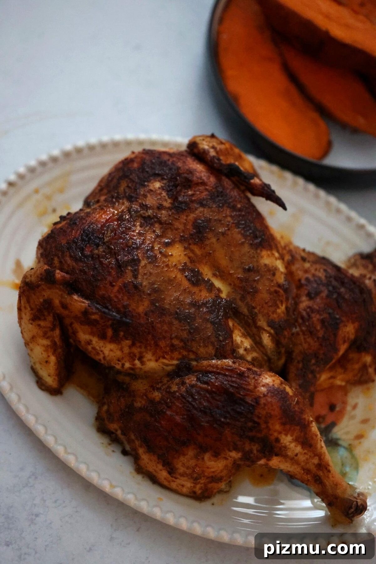 cooked spatchcock chicken up close.