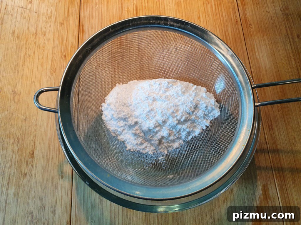 Sifting icing sugar