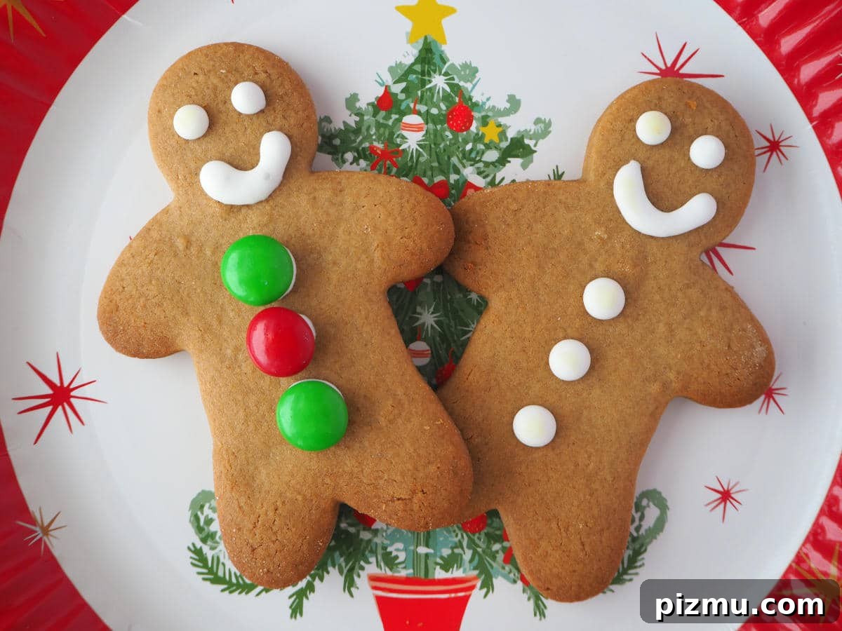 Pair of gingerbread men on a Christmas plate