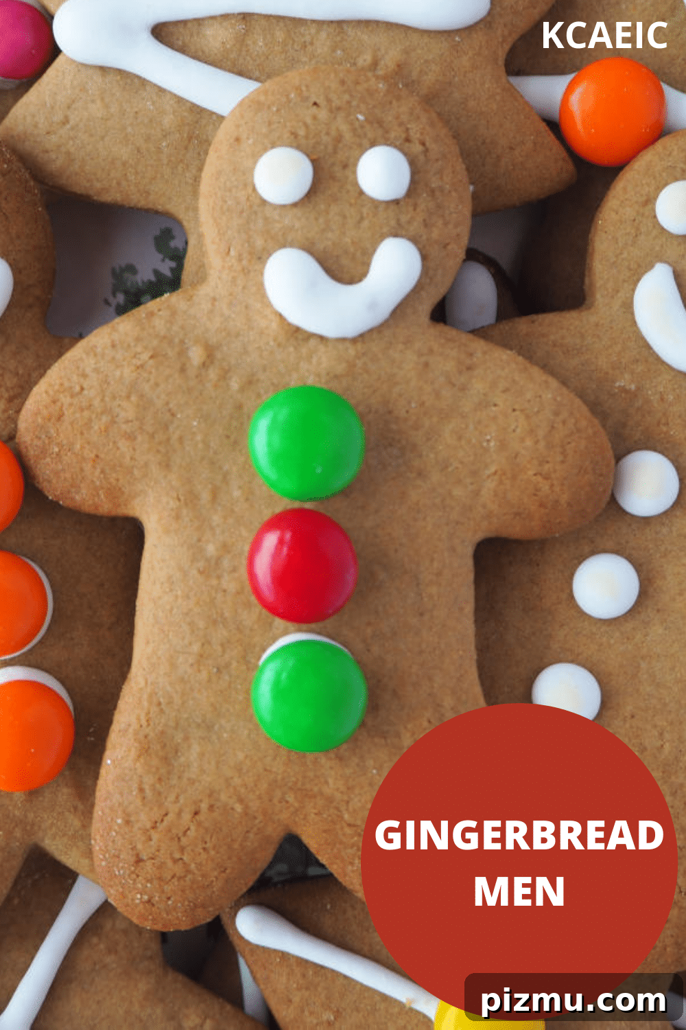 Close up single gingerbread man surrounded by other decorated gingerbread