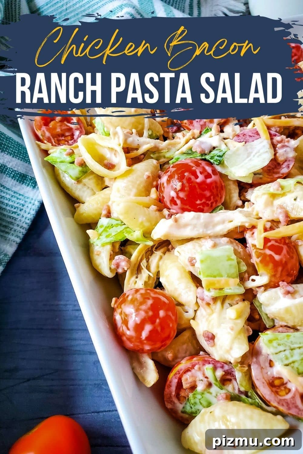close pic of chicken bacon ranch pasta salad in white square serving dish