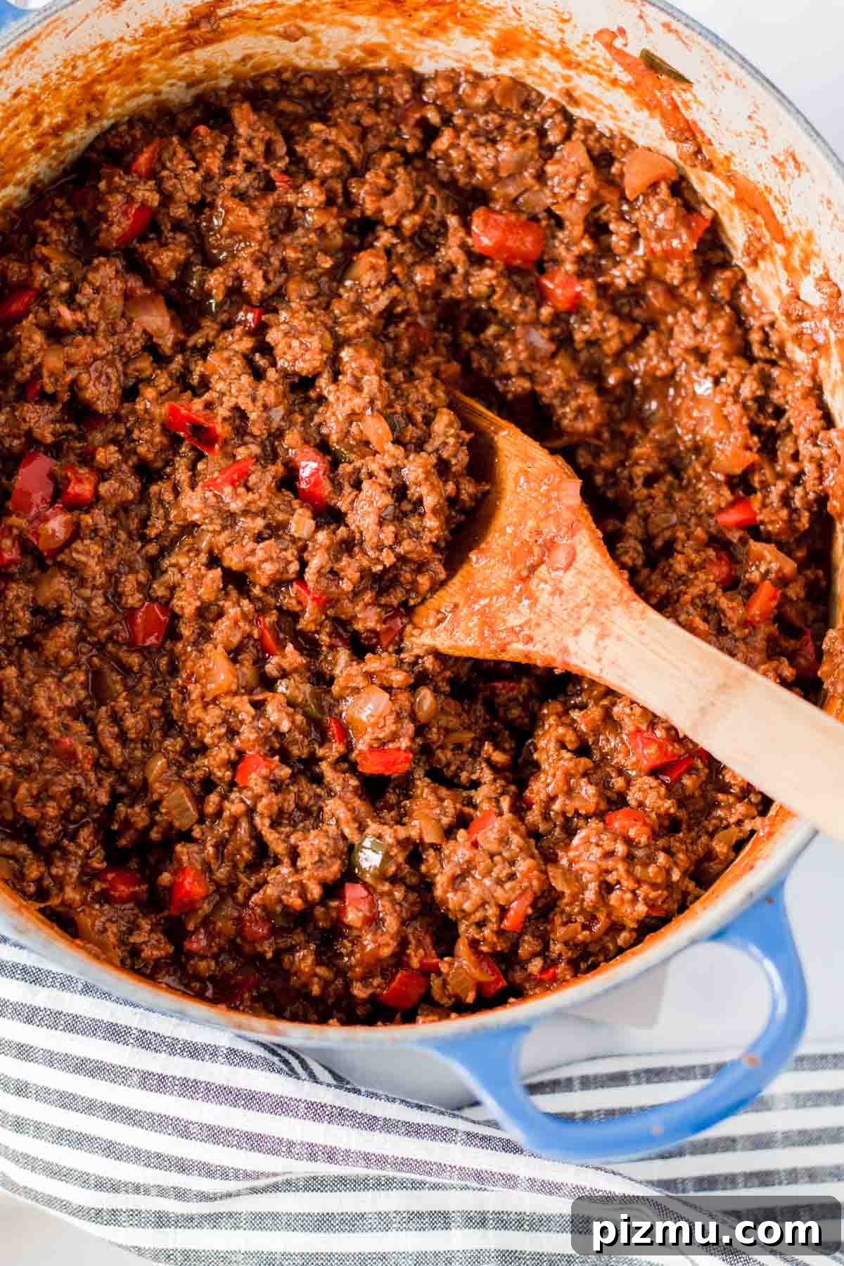 Homemade Gluten-Free Sloppy Joes 5 A large pot of sloppy joes with wooden spoon.