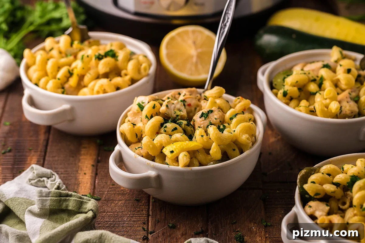 Creamy Lemon Chicken Pasta in the Instant Pot 2 Lemon chicken pasta in a white bowl.