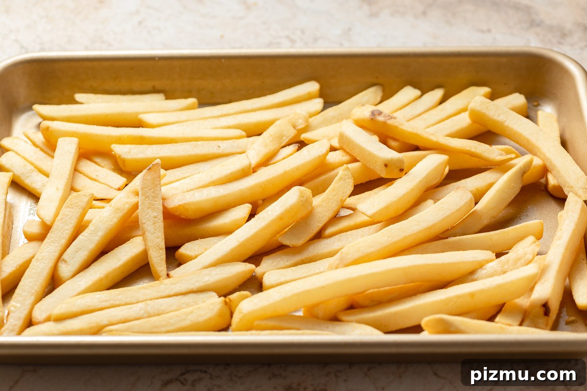 frozen french fries on a baking sheet