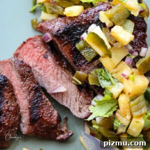 Grilled Steak with Charred Pineapple Jalapeno Salsa 15 square image of steak and pineapple salsa