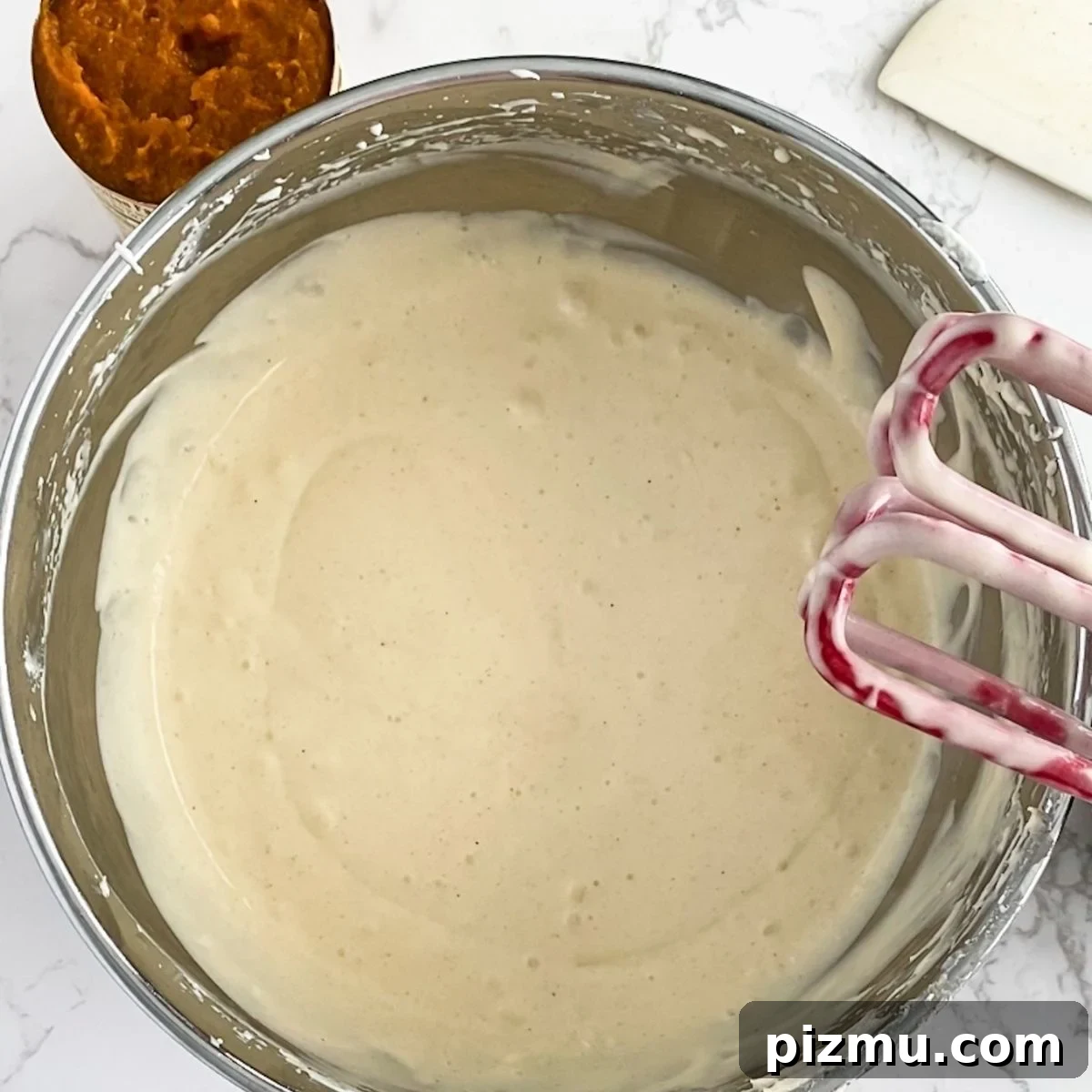 Paula Deen's Classic Pumpkin Cheesecake Recipe 8 cheesecake filling in a bowl.
