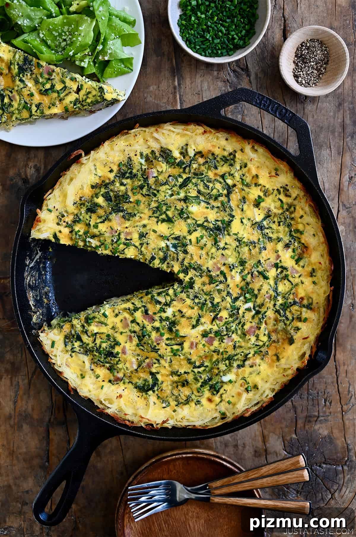 Ham and Cheese Quiche with Crispy Hash Brown Crust 2 Ham and cheese quiche with crispy hash brown crust in a cast iron skillet.