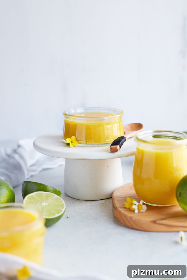 How to Make Lime Curd: Zesty Homemade Recipe 2 3 jars of lime curd arranged on a wooden board and a small white platter