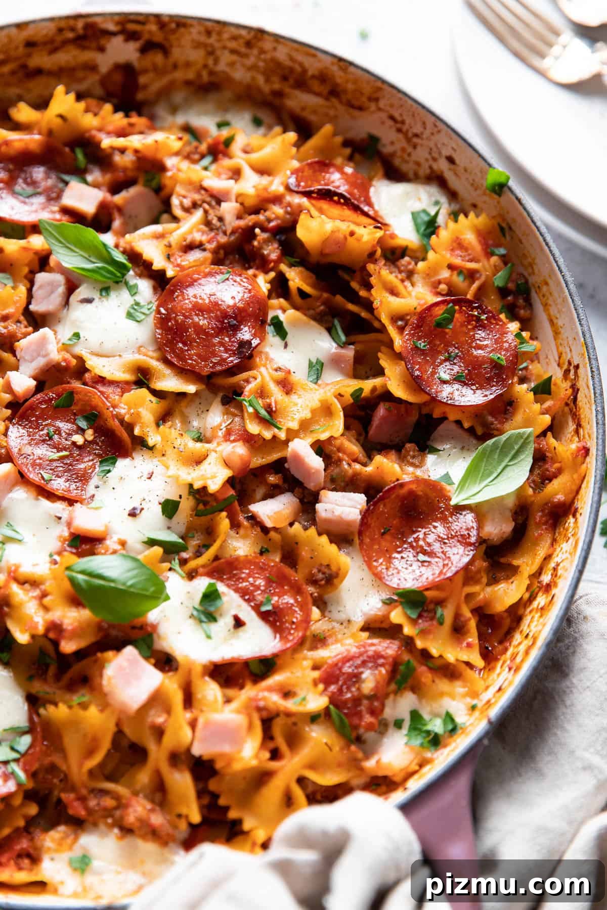 30-Minute One-Pot Meat-Lovers Pizza Pasta Bake 3 meat lovers pizza pasta bake.