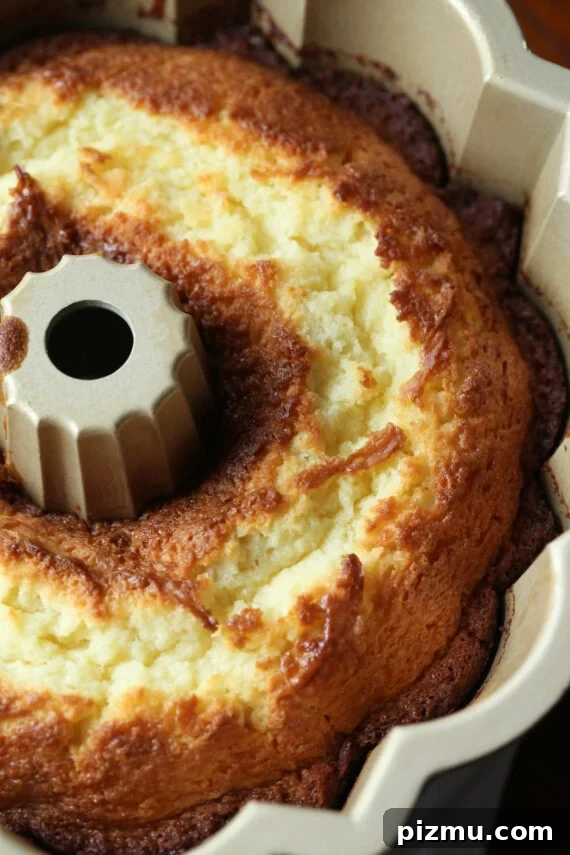 Bake. Baked 7UP cake in a bundt pan.