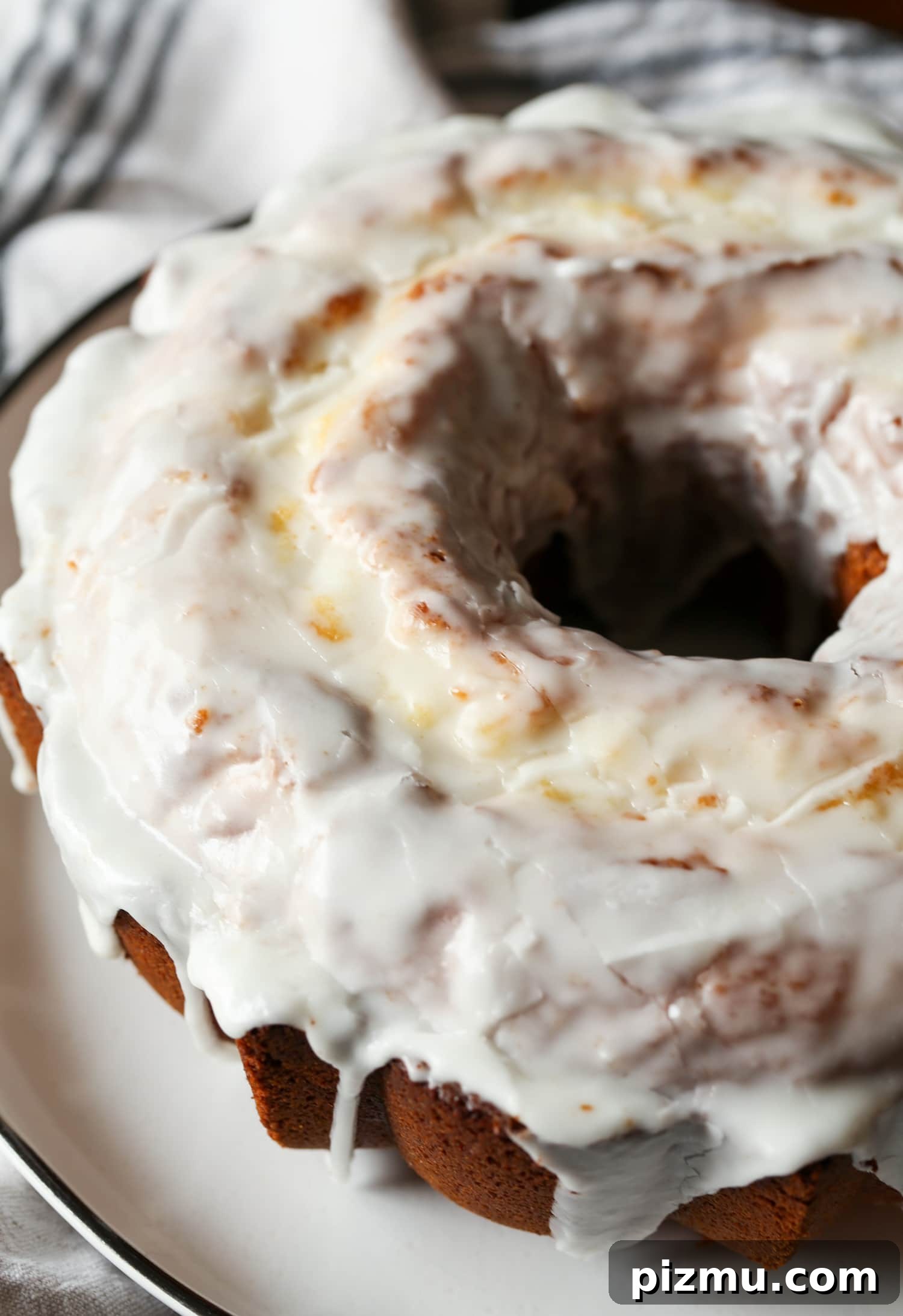 A 7UP pound cake covered with lemon icing. A 7UP pound cake covered with lemon icing.