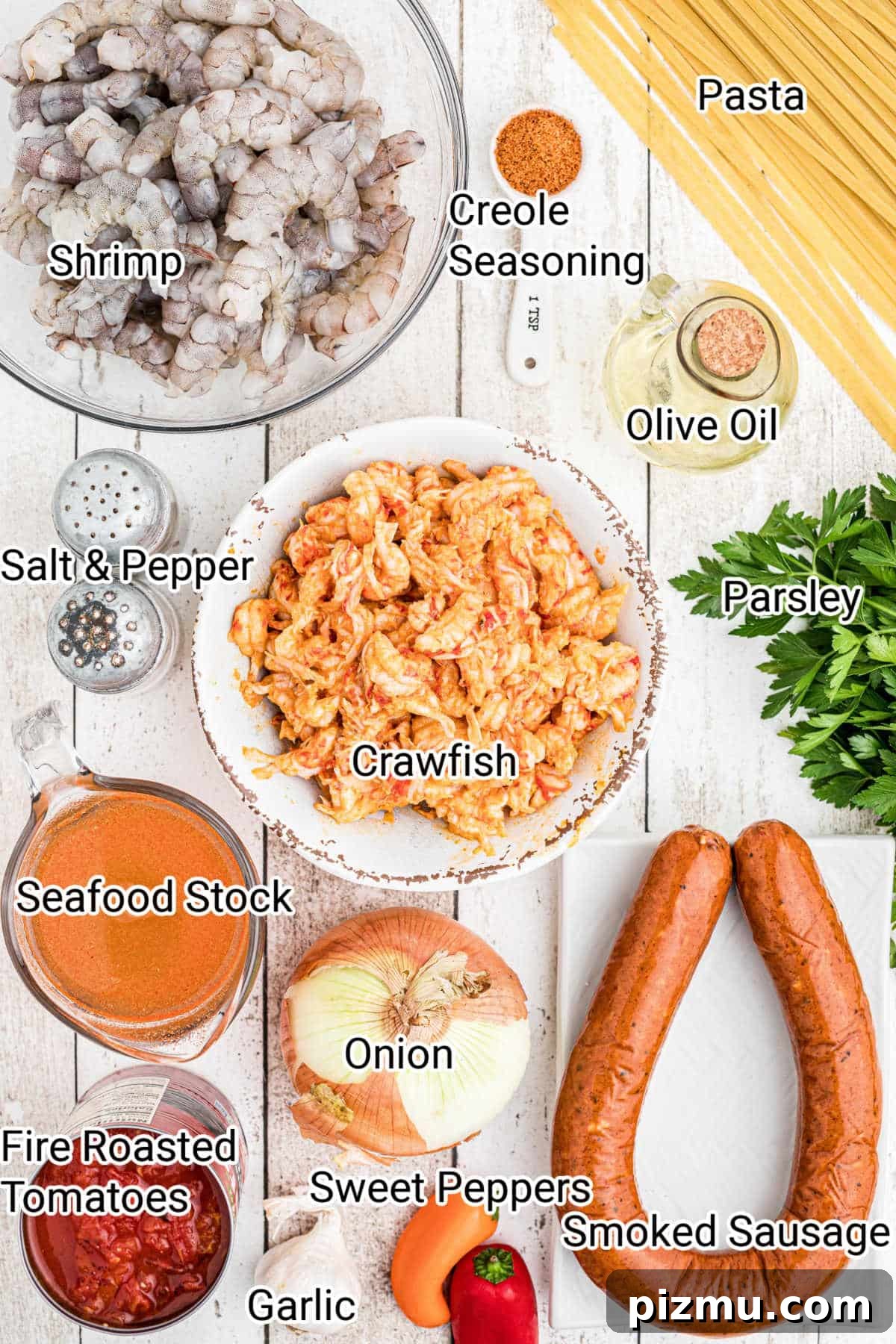 ingredients all laid out for what is needed to make a crawfish pastalaya recipe.