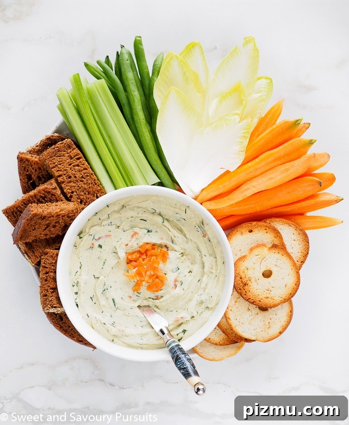 Smoked Salmon and Cream Cheese Dip Recipe 2 Smoked Salmon Cream Cheese Dip served with vegetables, pumpernickel bread, and bagel crisps