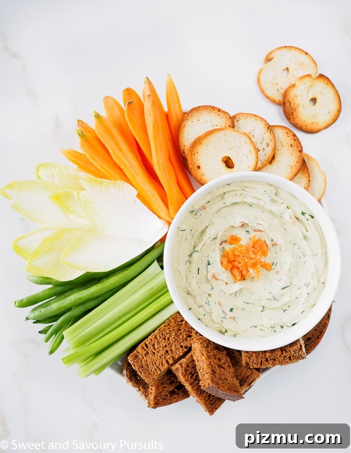 Smoked Salmon and Cream Cheese Dip Recipe 3 A Smoked Salmon Cream Cheese Dip served with veggies, bread and bagel crackers.