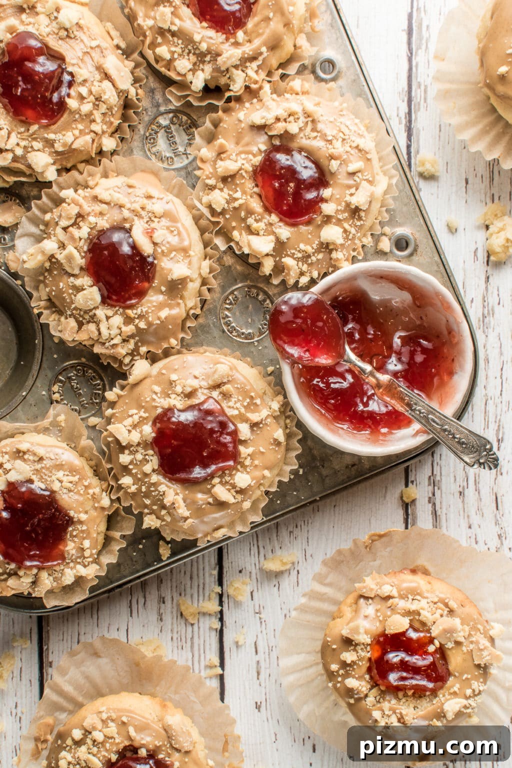 11 Keto Muffins for Quick Grab-and-Go Mornings 7 Low-carb PB&J muffins with roasted strawberry jam, a nostalgic gluten-free and keto breakfast idea for all ages.The image intended to show an example of keto muffin recipes you can make on a carb restricted diet.