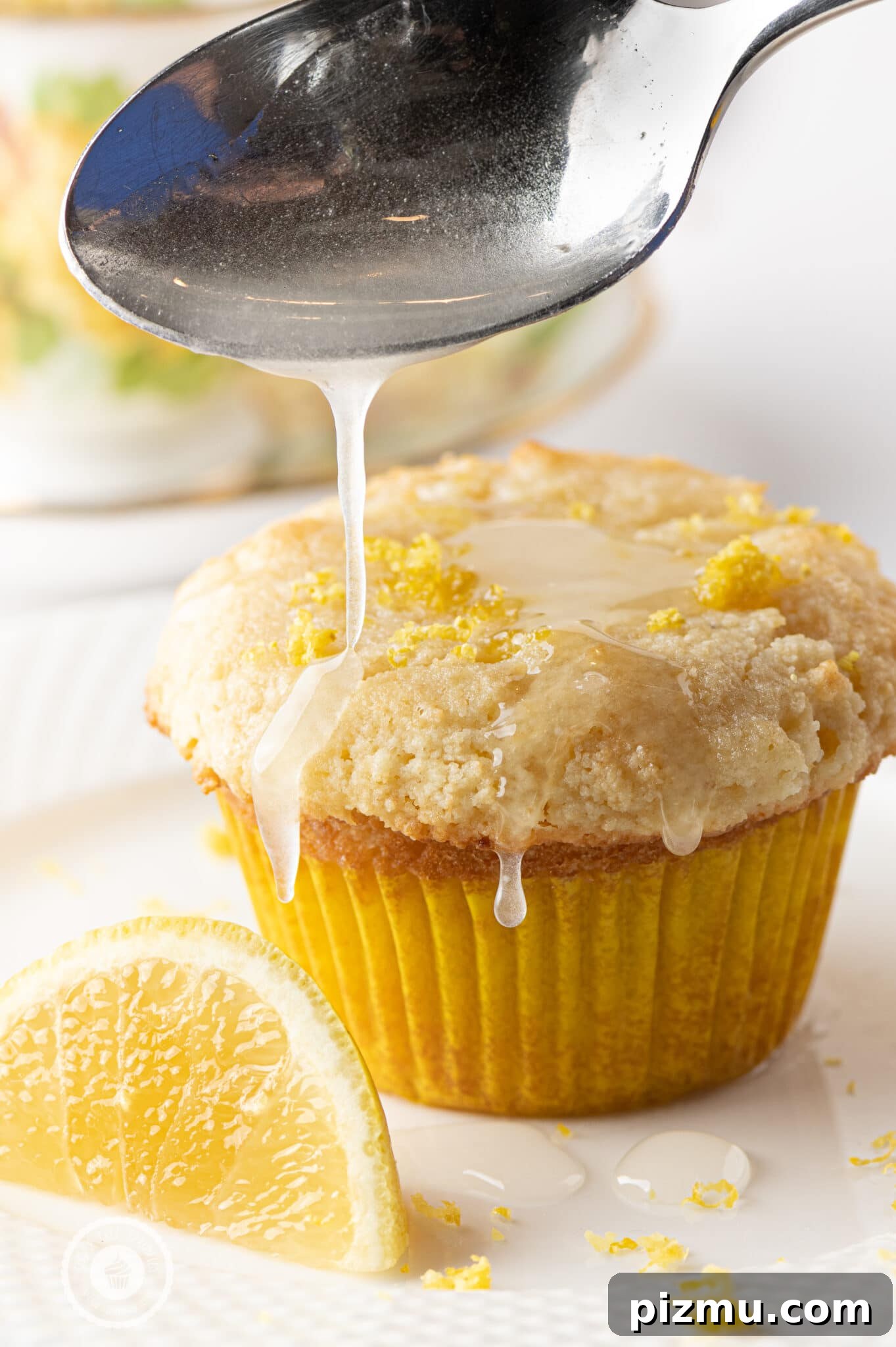 11 Keto Muffins for Quick Grab-and-Go Mornings 3 Keto lemon muffins with a sweet glaze, a refreshing low-carb muffin recipe perfect for breakfast on the go.
