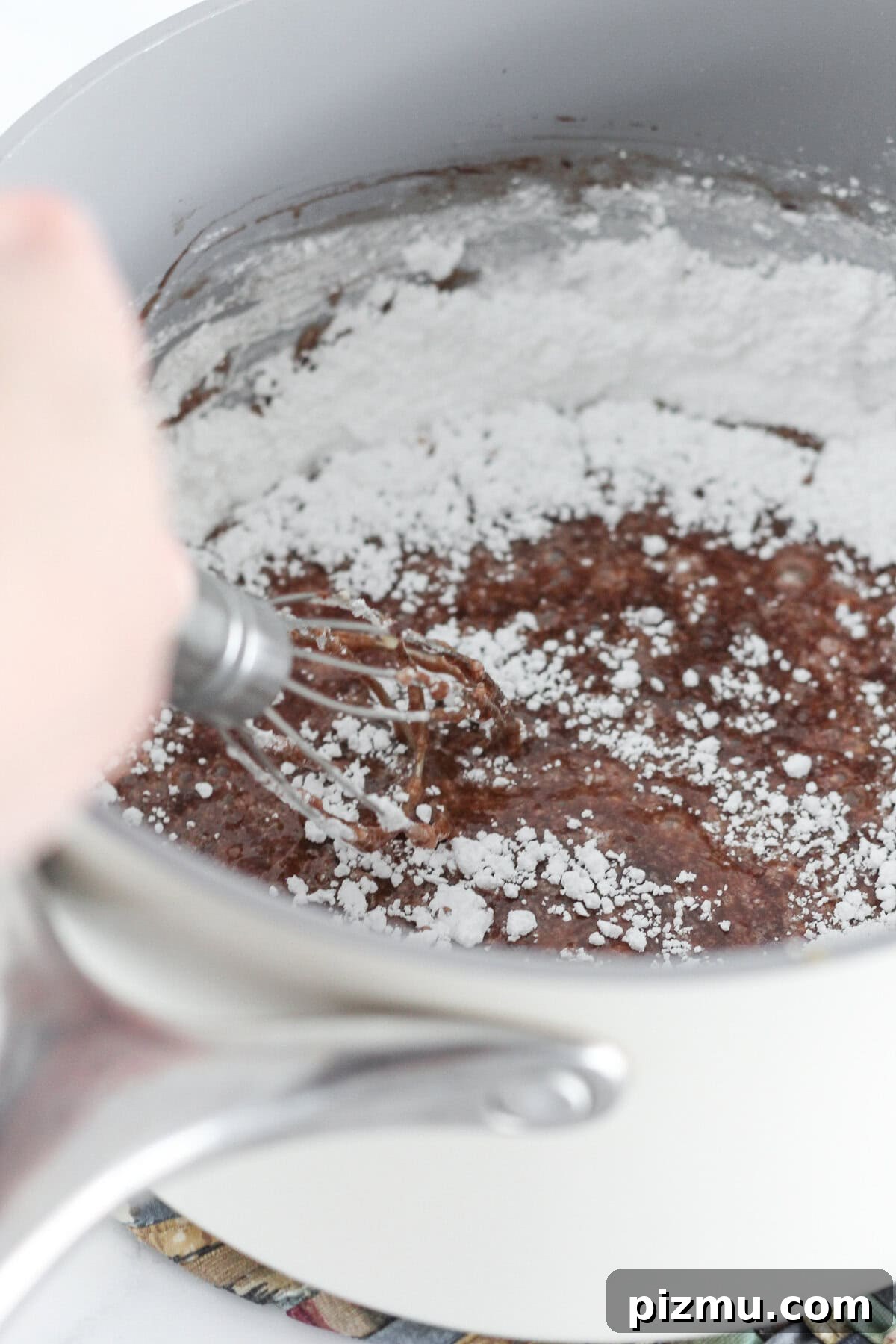 Moist Texas Sheet Cake Bundt: Chocolate Bundt Cake Recipe 7 Making the sheet cake frosting in a saucepan.
