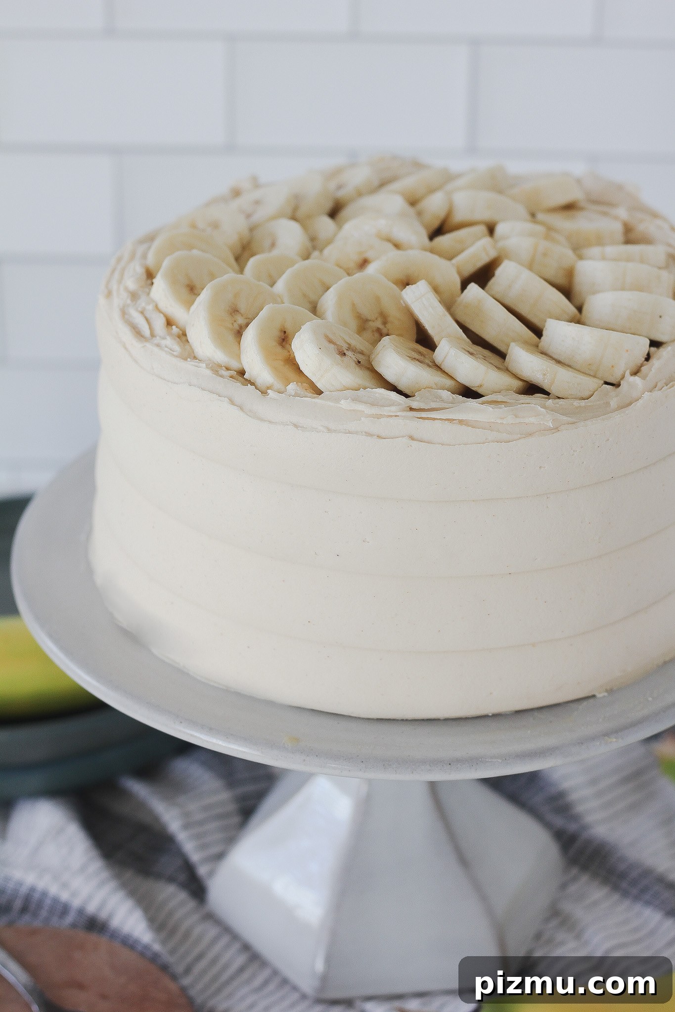 Decadent Peanut Butter Banana Cake Recipe 4 Baked peanut butter banana cake layers