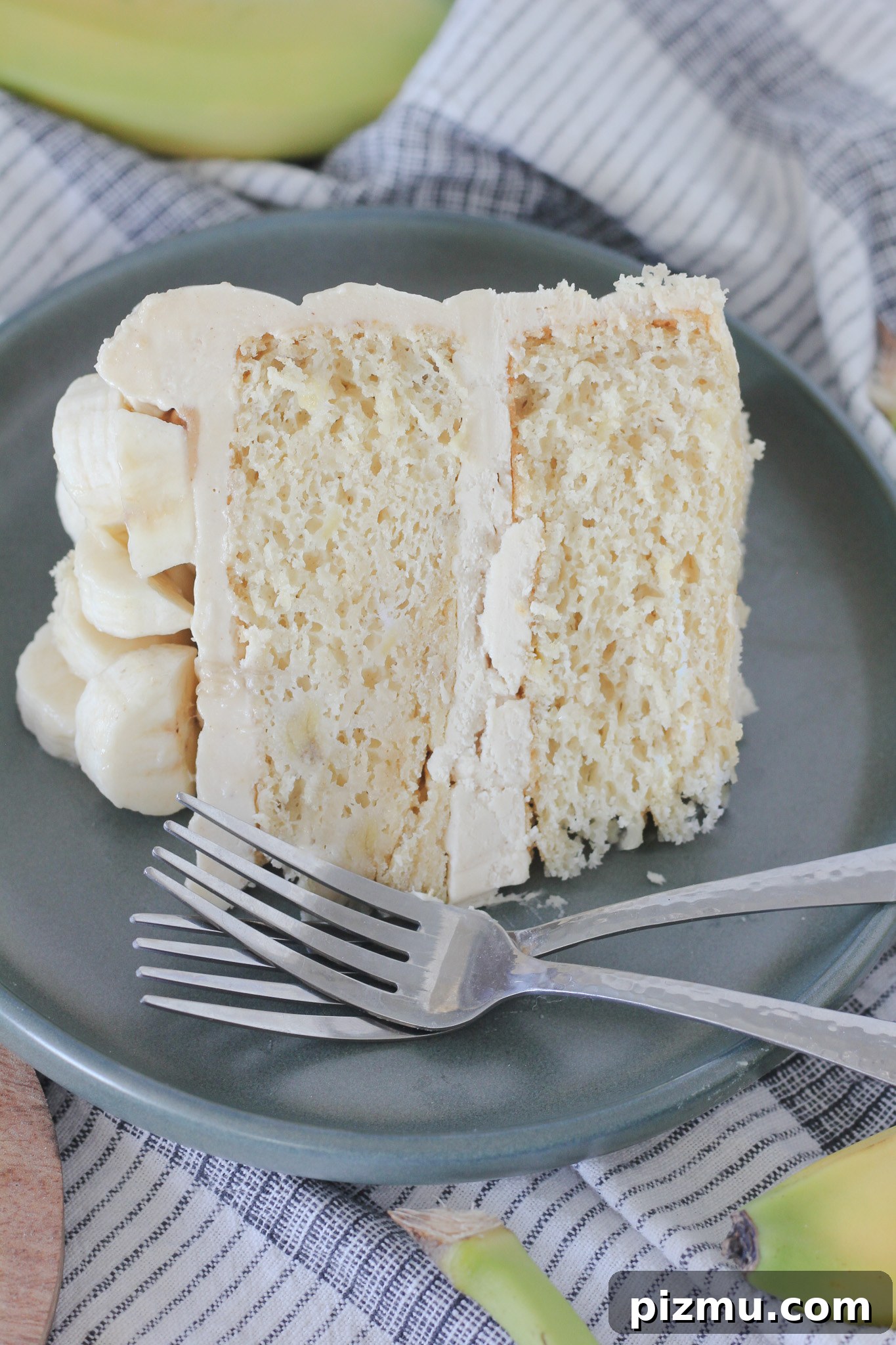 Decadent Peanut Butter Banana Cake Recipe 7 Spreading peanut butter buttercream