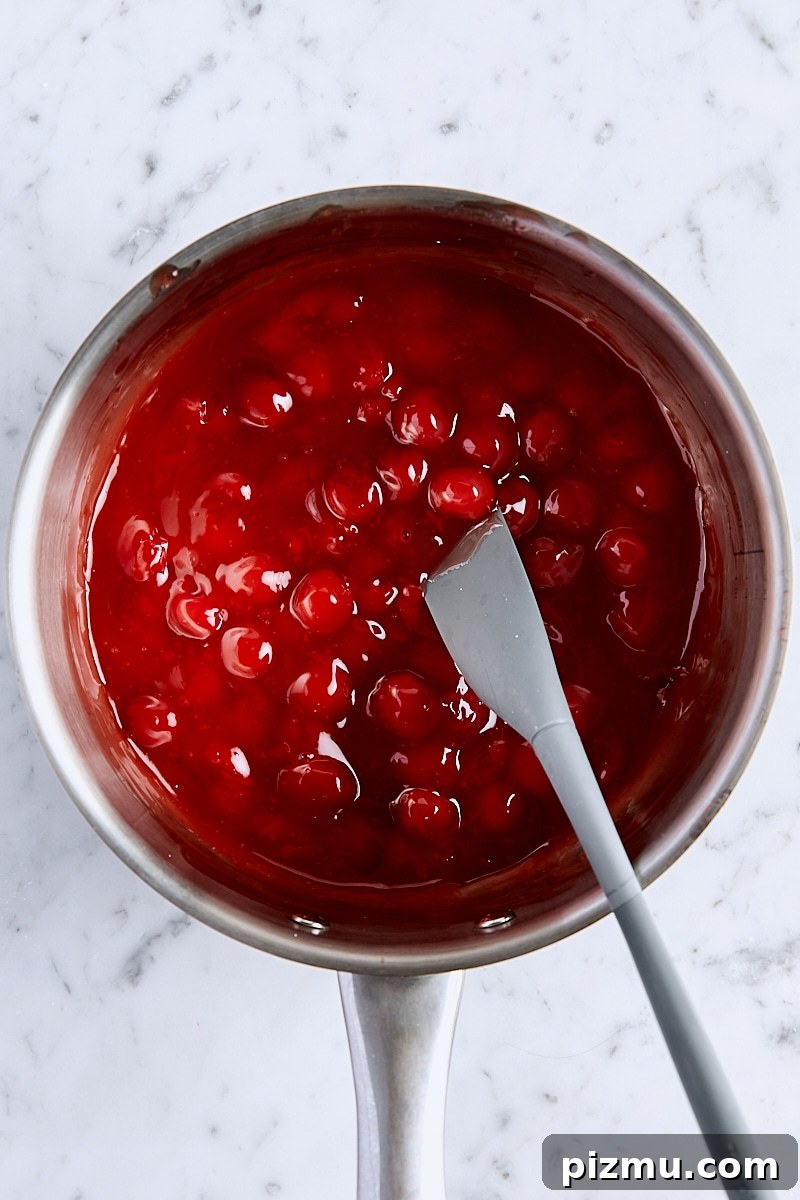 Cherry Pie Bars with Luscious Cherry Filling 9 Thickened cherry filling in saucepan