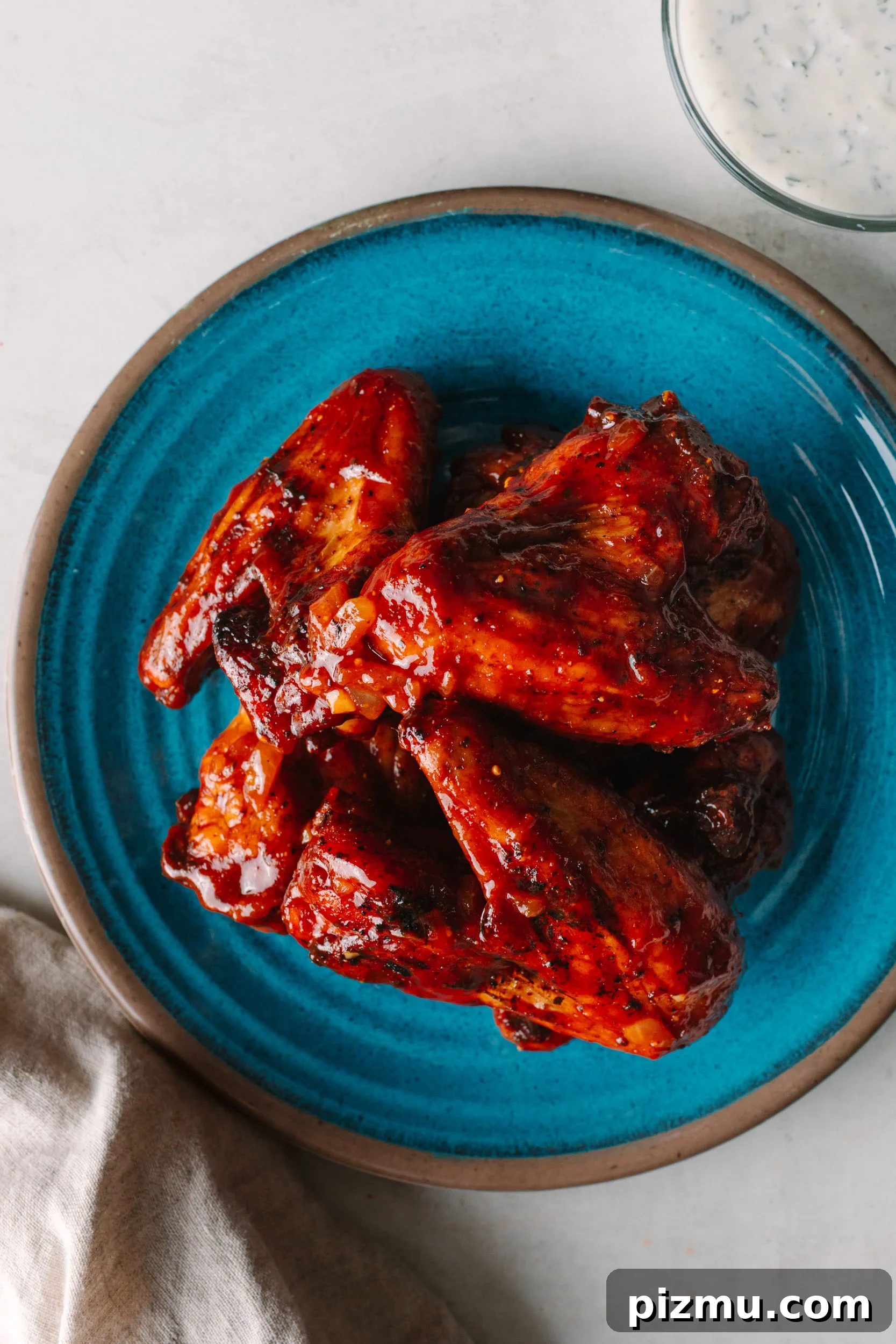Buffaque Wings Recipe: Buffalo BBQ Chicken Wings 2 Buffaque wings on a serving board